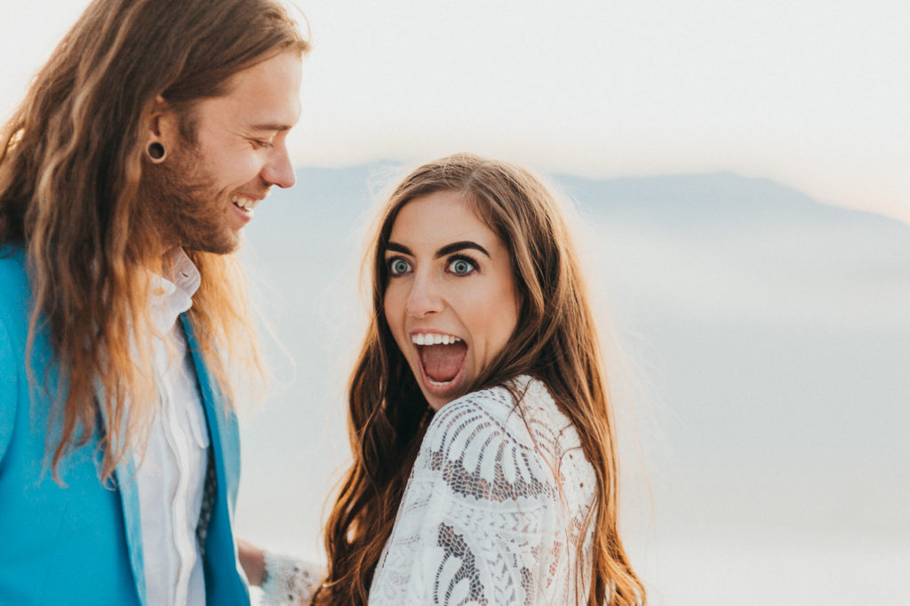 Choosing your wedding photographer.  Couple in the desert.